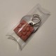 Clauer amb penjoll roseta de Bilbao en resina ceràmica