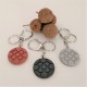 Key chain with round Bilbao rosette tile pendant in ceramic resin