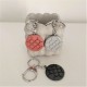Key chain with round Bilbao rosette tile pendant in ceramic resin
