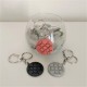 Key chain with round Bilbao rosette tile pendant in ceramic resin