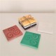 3 posavasos cuadrados con trisquel