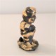 3 figuritas de Caganer  gris con acabado metal dorado