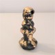 3 figuretes de Caganer en resina ceràmica gris amb acabat metall daurat