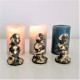 3 figuritas de Caganer  gris con acabado metal dorado
