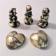 3 petjapapers de cor gris amb acabat de metall daurat