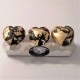 3 pisapapeles corazón gris con acabado metal dorado