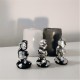 3 Caganer figurines in grey ceramic resin with silver metal finish