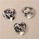 3 petjapapers de cor gris amb acabat de metall platejatat