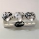 3 petjapapers de cor gris amb acabat de metall platejatat