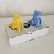 2 origami-style paper birds