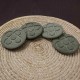 4 round Panot coasters,dark grey concrete, Barcelona flower