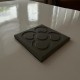 Salvamantel Flor de Barcelona hormigón